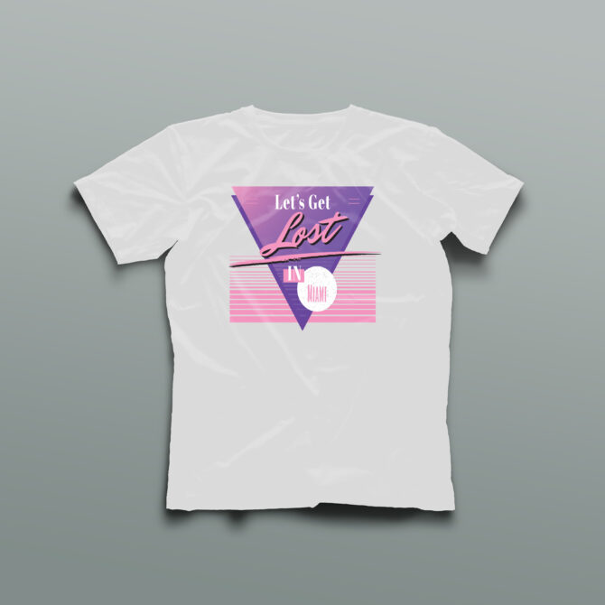 White t-shirt with a purple triangle, pink neon lines, and the phrase “Let’s Get Lost in Miami” in a bold retro-futuristic font, reflecting 80s-inspired Miami fashion.